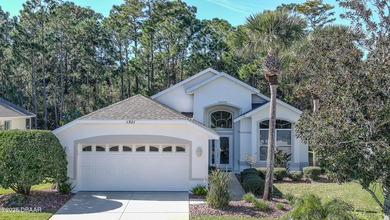 This meticulously maintained 3 BR 2 BA home is offered furnished on Plantation Bay Golf and Country Club in Florida - for sale on GolfHomes.com, golf home, golf lot
