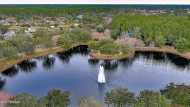 This meticulously maintained 3 BR 2 BA home is offered furnished on Plantation Bay Golf and Country Club in Florida - for sale on GolfHomes.com, golf home, golf lot