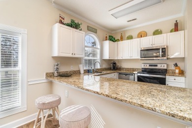 Discover your dream home in this charming 2-bedroom, 2-bath on Myrtlewood Golf Course and Club  in South Carolina - for sale on GolfHomes.com, golf home, golf lot