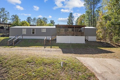 Discover the perfect getaway with this 3 bedroom, 2 bathroom on Rayburn Country Club in Texas - for sale on GolfHomes.com, golf home, golf lot