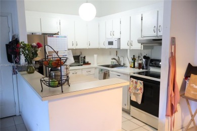 This unit is conveniently located in the center of Doral, close on Jim McLean Signature Course in Florida - for sale on GolfHomes.com, golf home, golf lot