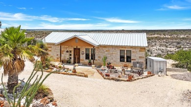 Welcome to 202 Bluebonnet Drive; your perfect Lake Home Retreat! on San Felipe Country Club in Texas - for sale on GolfHomes.com, golf home, golf lot