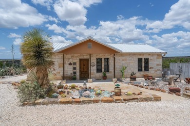 Welcome to 202 Bluebonnet Drive; your perfect Lake Home Retreat! on San Felipe Country Club in Texas - for sale on GolfHomes.com, golf home, golf lot