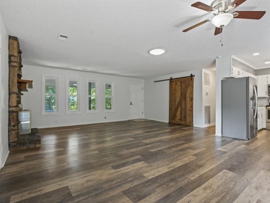 Tucked away near DeSoto Lake, this beautifully refreshed 2 on DeSoto Golf Course in Arkansas - for sale on GolfHomes.com, golf home, golf lot