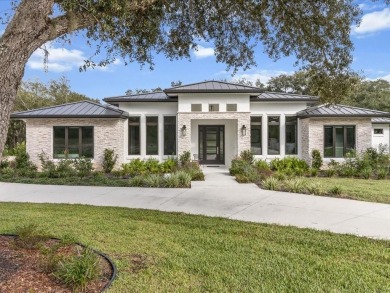 Luxury, efficiency, and elegance converge in this 2022 on Black Diamond Ranch Golf Course in Florida - for sale on GolfHomes.com, golf home, golf lot
