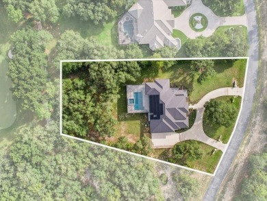 Luxury, efficiency, and elegance converge in this 2022 on Black Diamond Ranch Golf Course in Florida - for sale on GolfHomes.com, golf home, golf lot