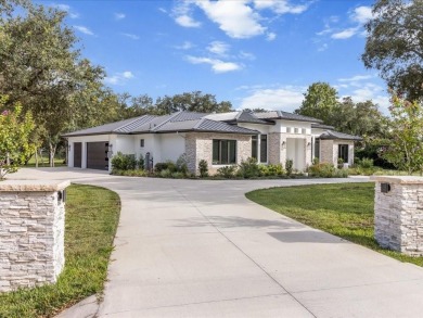 Luxury, efficiency, and elegance converge in this 2022 on Black Diamond Ranch Golf Course in Florida - for sale on GolfHomes.com, golf home, golf lot