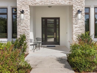 Luxury, efficiency, and elegance converge in this 2022 on Black Diamond Ranch Golf Course in Florida - for sale on GolfHomes.com, golf home, golf lot