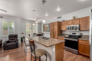 Presenting a beautifully maintained and expanded 2-bedroom plus on Arizona Traditions Golf Club in Arizona - for sale on GolfHomes.com, golf home, golf lot
