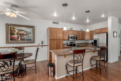 Presenting a beautifully maintained and expanded 2-bedroom plus on Arizona Traditions Golf Club in Arizona - for sale on GolfHomes.com, golf home, golf lot