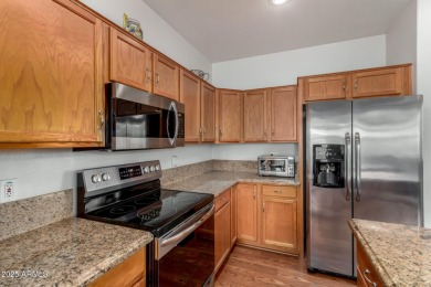 Presenting a beautifully maintained and expanded 2-bedroom plus on Arizona Traditions Golf Club in Arizona - for sale on GolfHomes.com, golf home, golf lot