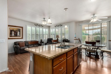 Presenting a beautifully maintained and expanded 2-bedroom plus on Arizona Traditions Golf Club in Arizona - for sale on GolfHomes.com, golf home, golf lot