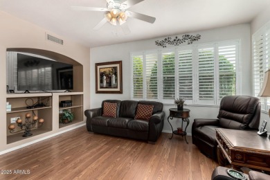Presenting a beautifully maintained and expanded 2-bedroom plus on Arizona Traditions Golf Club in Arizona - for sale on GolfHomes.com, golf home, golf lot