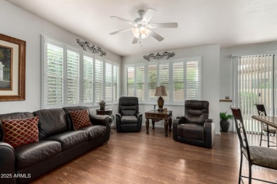 Presenting a beautifully maintained and expanded 2-bedroom plus on Arizona Traditions Golf Club in Arizona - for sale on GolfHomes.com, golf home, golf lot