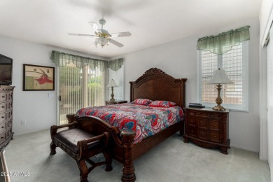 Presenting a beautifully maintained and expanded 2-bedroom plus on Arizona Traditions Golf Club in Arizona - for sale on GolfHomes.com, golf home, golf lot