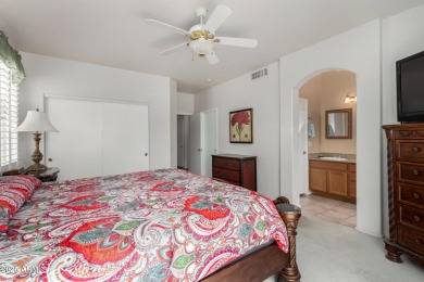 Presenting a beautifully maintained and expanded 2-bedroom plus on Arizona Traditions Golf Club in Arizona - for sale on GolfHomes.com, golf home, golf lot