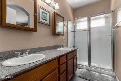 Presenting a beautifully maintained and expanded 2-bedroom plus on Arizona Traditions Golf Club in Arizona - for sale on GolfHomes.com, golf home, golf lot
