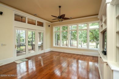 A home built for comfort and entertaining awaits you.  The front on Ocean Ridge Plantation in North Carolina - for sale on GolfHomes.com, golf home, golf lot