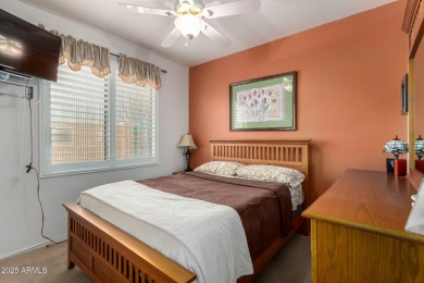 Presenting a beautifully maintained and expanded 2-bedroom plus on Arizona Traditions Golf Club in Arizona - for sale on GolfHomes.com, golf home, golf lot