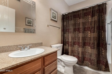 Presenting a beautifully maintained and expanded 2-bedroom plus on Arizona Traditions Golf Club in Arizona - for sale on GolfHomes.com, golf home, golf lot
