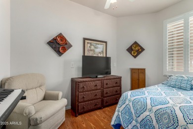 Presenting a beautifully maintained and expanded 2-bedroom plus on Arizona Traditions Golf Club in Arizona - for sale on GolfHomes.com, golf home, golf lot
