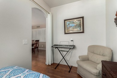Presenting a beautifully maintained and expanded 2-bedroom plus on Arizona Traditions Golf Club in Arizona - for sale on GolfHomes.com, golf home, golf lot