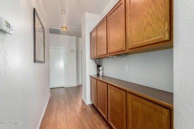 Presenting a beautifully maintained and expanded 2-bedroom plus on Arizona Traditions Golf Club in Arizona - for sale on GolfHomes.com, golf home, golf lot