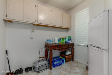 Presenting a beautifully maintained and expanded 2-bedroom plus on Arizona Traditions Golf Club in Arizona - for sale on GolfHomes.com, golf home, golf lot