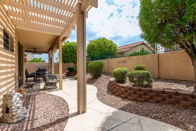 Presenting a beautifully maintained and expanded 2-bedroom plus on Arizona Traditions Golf Club in Arizona - for sale on GolfHomes.com, golf home, golf lot