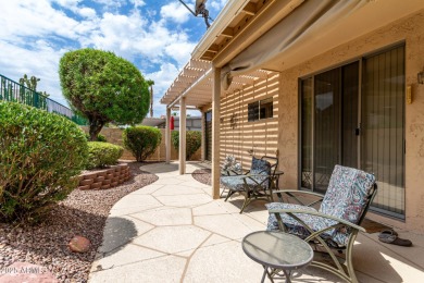 Presenting a beautifully maintained and expanded 2-bedroom plus on Arizona Traditions Golf Club in Arizona - for sale on GolfHomes.com, golf home, golf lot