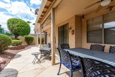 Presenting a beautifully maintained and expanded 2-bedroom plus on Arizona Traditions Golf Club in Arizona - for sale on GolfHomes.com, golf home, golf lot