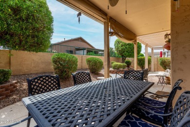 Presenting a beautifully maintained and expanded 2-bedroom plus on Arizona Traditions Golf Club in Arizona - for sale on GolfHomes.com, golf home, golf lot