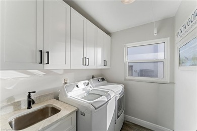 OVERSIZED TIP LOT WITH 168 FT OF CANAL FRONTAGE! Just a on Saint Andrews South Golf Club in Florida - for sale on GolfHomes.com, golf home, golf lot