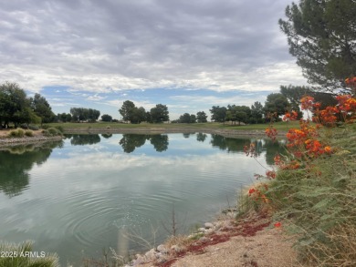 Presenting a beautifully maintained and expanded 2-bedroom plus on Arizona Traditions Golf Club in Arizona - for sale on GolfHomes.com, golf home, golf lot
