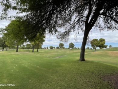 Presenting a beautifully maintained and expanded 2-bedroom plus on Arizona Traditions Golf Club in Arizona - for sale on GolfHomes.com, golf home, golf lot