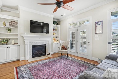 Handsome townhome tucked behind the 15th green of Raintree's on Raintree Country Club in North Carolina - for sale on GolfHomes.com, golf home, golf lot