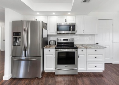 Welcome to your new home in The Mainlands of Tamarac by the on Mainlands Golf Club in Florida - for sale on GolfHomes.com, golf home, golf lot