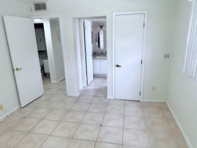 1st floor corner 2 bedroom,2 bath quiet Tilford location on Hillsboro Pines Golf in Florida - for sale on GolfHomes.com, golf home, golf lot