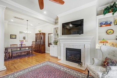 Handsome townhome tucked behind the 15th green of Raintree's on Raintree Country Club in North Carolina - for sale on GolfHomes.com, golf home, golf lot