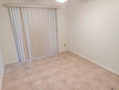 1st floor corner 2 bedroom,2 bath quiet Tilford location on Hillsboro Pines Golf in Florida - for sale on GolfHomes.com, golf home, golf lot