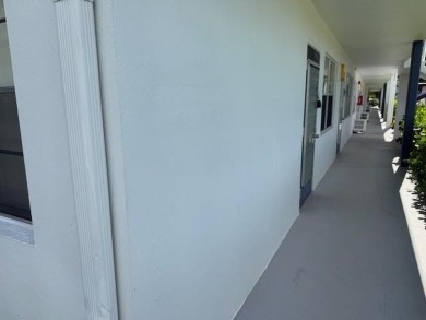 1st floor corner 2 bedroom,2 bath quiet Tilford location on Hillsboro Pines Golf in Florida - for sale on GolfHomes.com, golf home, golf lot