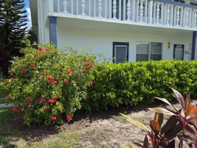 1st floor corner 2 bedroom,2 bath quiet Tilford location on Hillsboro Pines Golf in Florida - for sale on GolfHomes.com, golf home, golf lot