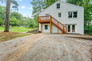 It's hard to miss this fully renovated, 4 side brick beauty on Alfred Tup Holmes Golf Course in Georgia - for sale on GolfHomes.com, golf home, golf lot