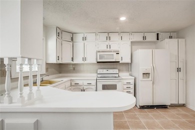 Beautifully updated and spacious home backing near the National on National Golf Club of Kansas City in Missouri - for sale on GolfHomes.com, golf home, golf lot