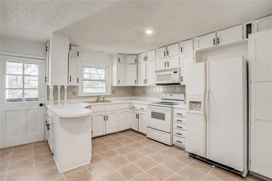 Beautifully updated and spacious home backing near the National on National Golf Club of Kansas City in Missouri - for sale on GolfHomes.com, golf home, golf lot