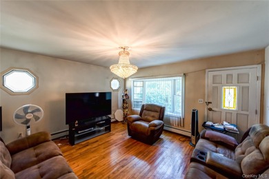 This well-proportioned home offers a formal dining room on Brentwood Country Club in New York - for sale on GolfHomes.com, golf home, golf lot
