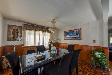 This well-proportioned home offers a formal dining room on Brentwood Country Club in New York - for sale on GolfHomes.com, golf home, golf lot