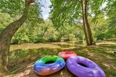 Riverfront living at it's finest with 110 feet of river frontage on White Path Golf Club in Georgia - for sale on GolfHomes.com, golf home, golf lot