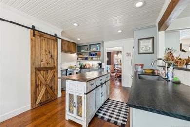 Beautifully remodeled full brick home nestled in a cul-de-sac on on Indian Springs Country Club in Oklahoma - for sale on GolfHomes.com, golf home, golf lot
