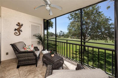 GORGEOUS & nestled on the golf greens with peaceful views, this on Isla Del Sol Yacht and Country Club in Florida - for sale on GolfHomes.com, golf home, golf lot